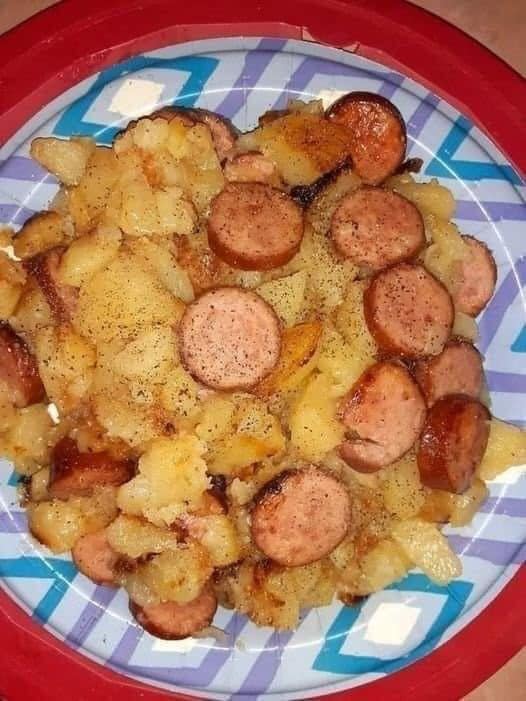 Onions, fried potatoes, and smoked Polish sausage