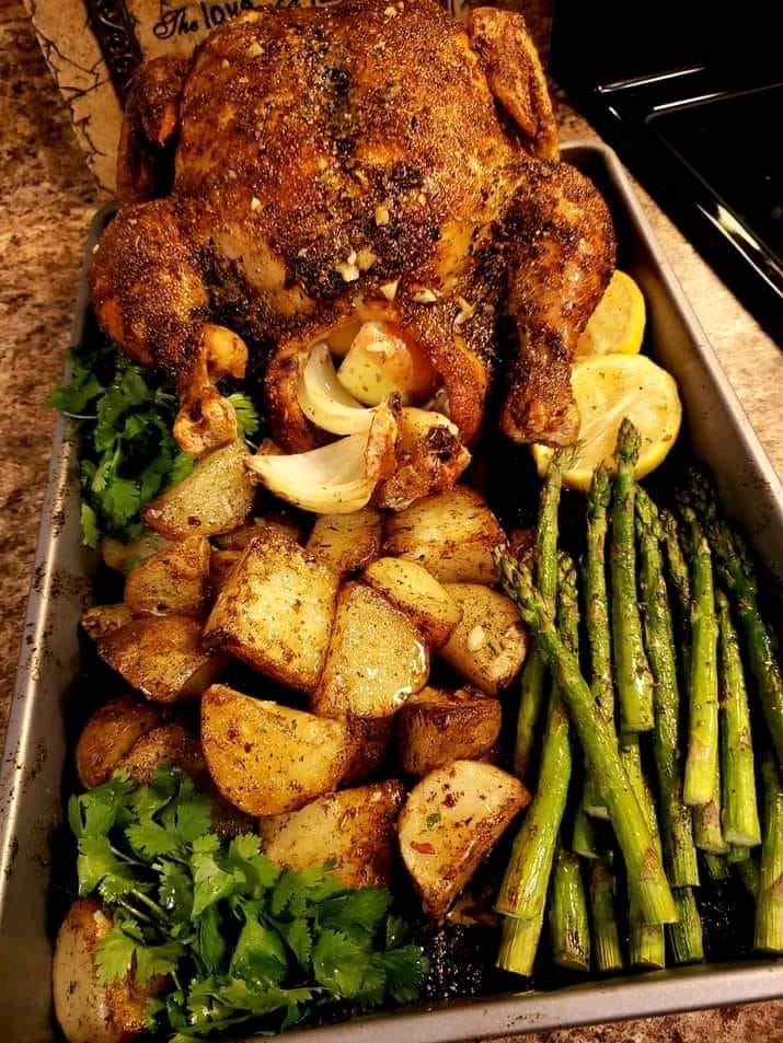 Lemon thyme roasted chicken, garlic butter roasted potatoes, and asparagus