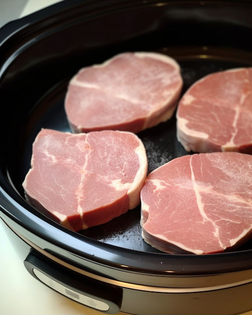 Put these three ingredients in a slow cooker for tender pork chops.