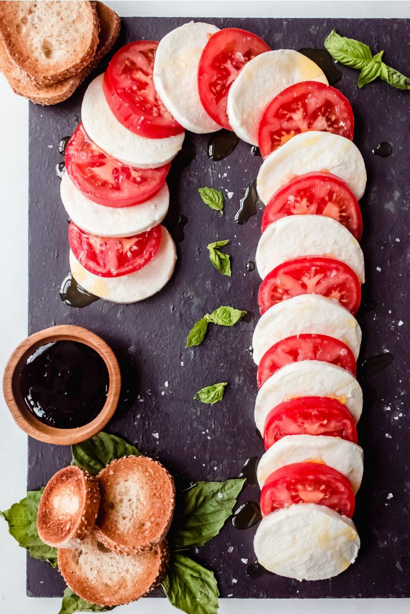 Spread Holiday Cheer with a Candy Cane Caprese Board