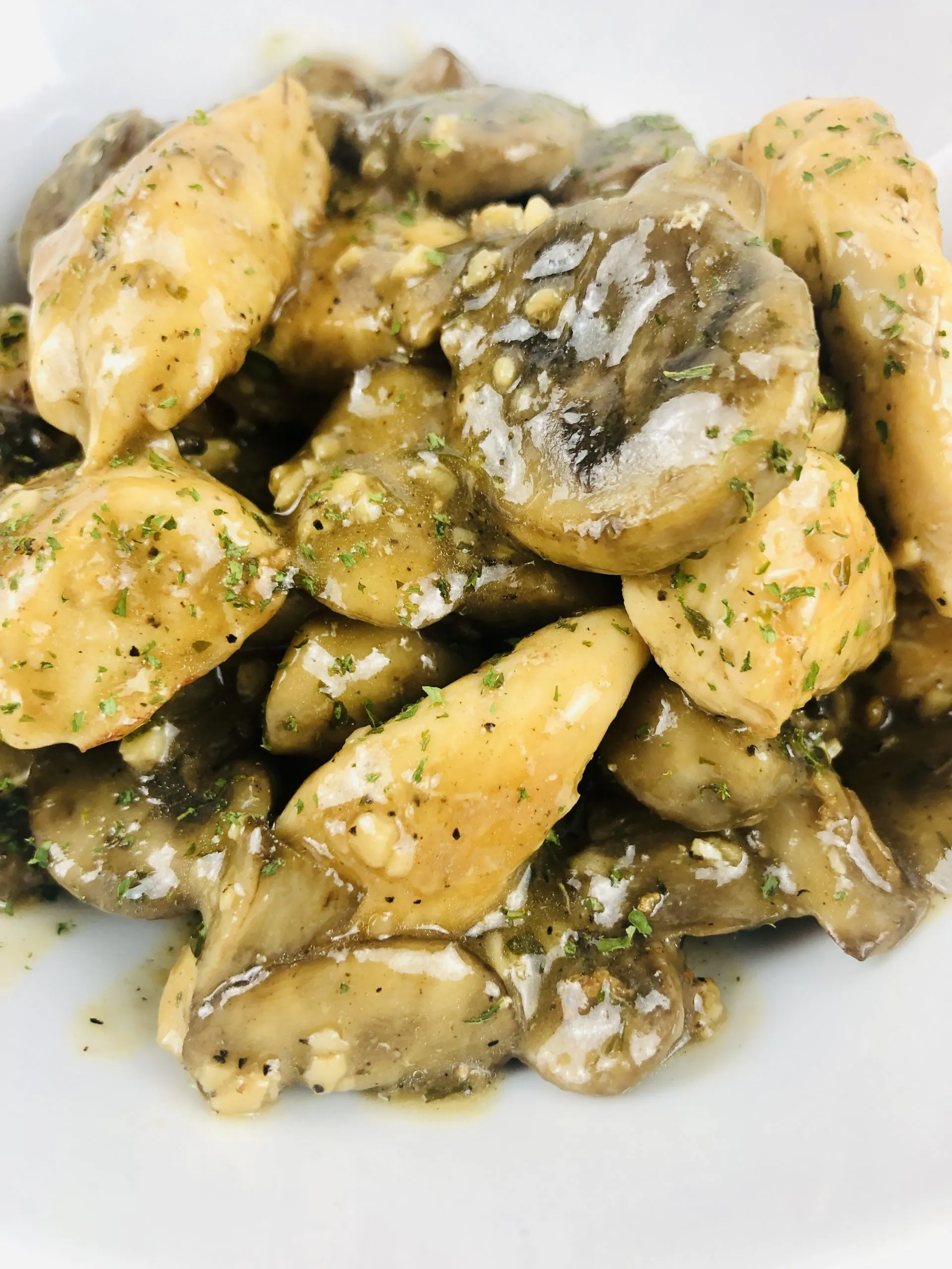 Delicious Chicken and Mushrooms in a Garlic White Wine Sauce