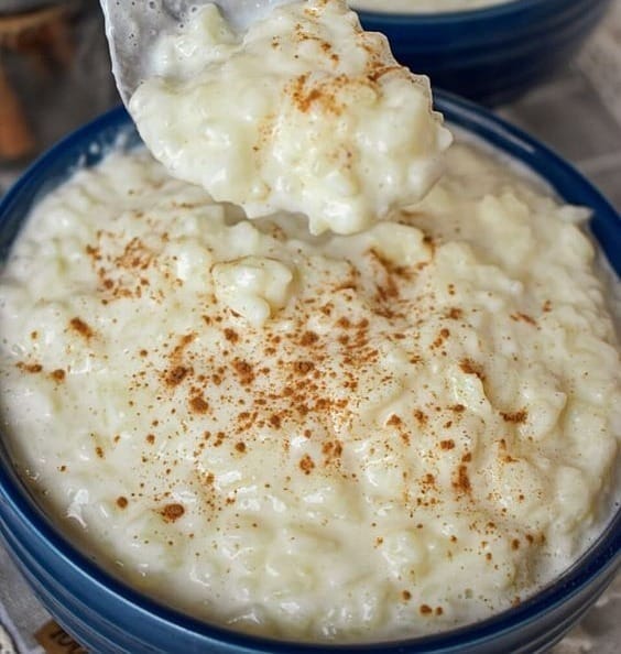 Rediscover Comfort with Old-Fashioned Rice Pudding!  Dive Into Creamy Bliss with Just Four Ingredients! Try It Today and Relive the Good Old Days!