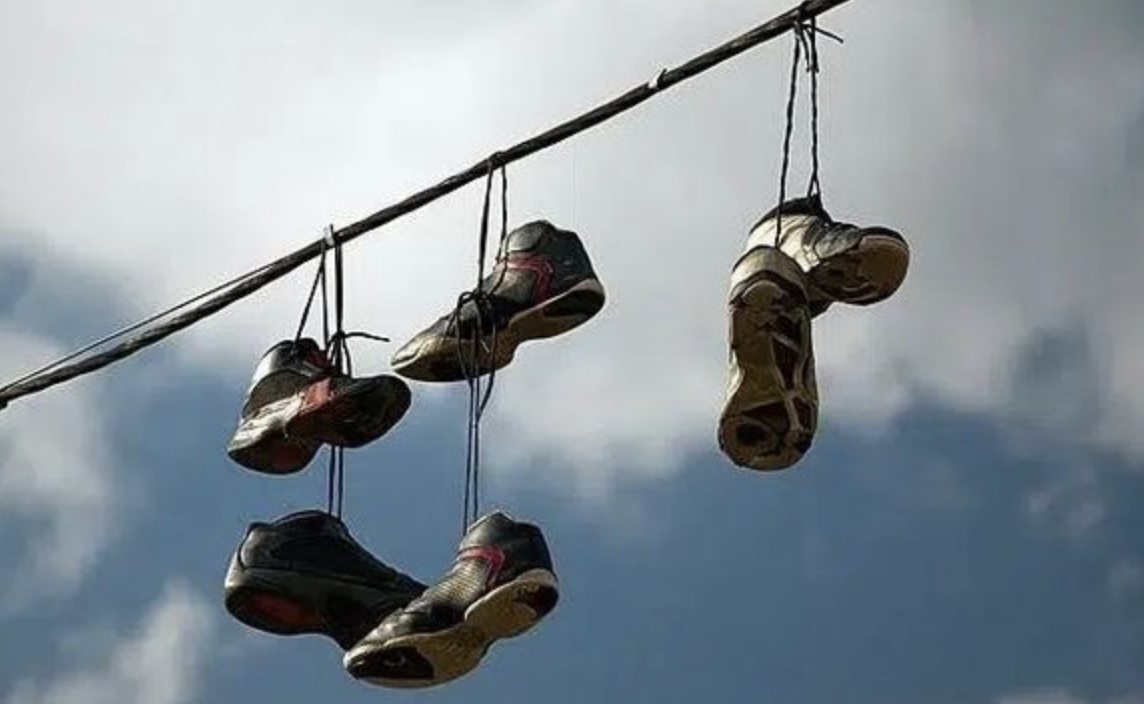 The Mystery of Sneakers on Power Lines